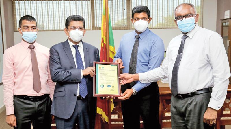 From left: CEO Sri Lanka Climate Fund Chamara Ariyathilaka, Secretary to the Ministry of Environment Dr. Anil Jasinghe, Cargills Quality Dairies and Kotmale Dairy Products Managing Director Saranga Wijesundara,  Group Manager Manufacturing - Dairy sector Nimal Gunarathna.