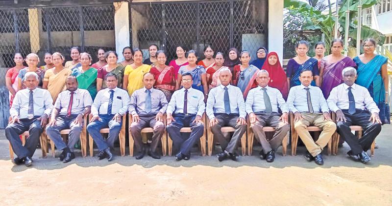 Teachers after receiving letters of appointment as ISAs posed for a group photograph with the New Zonal Director of Education at the office premises. Text and Pic: H.L. Sunil Shantha, Kalutara Central Special Cor.