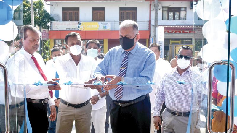 Chairman of Lanka Credit and Business, Bandula Nanayakkara opens the branch