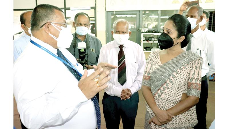 DPMC Director, Parts and Accessories, Jayantha Ratnayake explains the services provided by DPMC to State Minister Dr. Seetha Arambepola