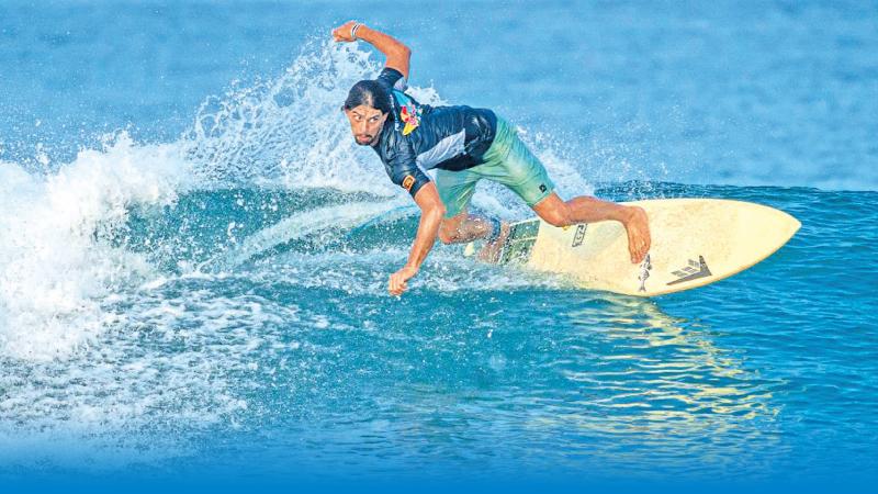 Lakshitha Madushan surfing in a competition