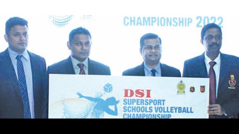 Managing Director of D Samson Industries Thusitha Rajapakse (second from left) presents the sponsorship to the president of the Sri Lanka Volleyball Federation Kanchana Jayaratne. Also in the picture are Director DSI, Asanga Rajapaksa and Secretary SLVF AS Nalaka (Picture by Saliya Rupesinghe)