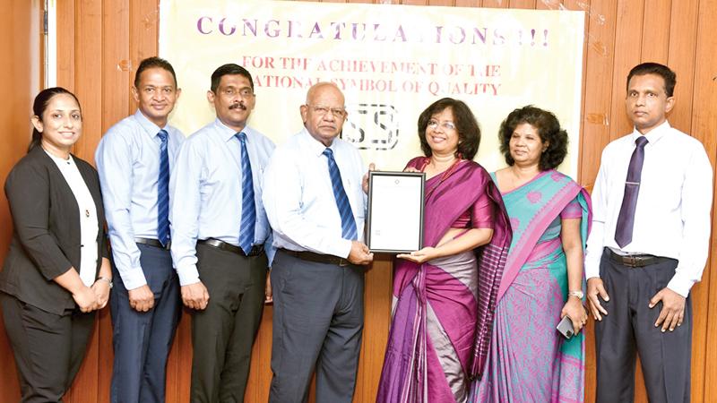From left: From Kelani Cables PLC,  Asst. Manager, Quality Assurance, Ms. Gayathri Ekanayake,   Sales Manager, Power and Energy, Rohana, , General Manager, Marketing, Dr. Anil Munasinghe and Kelani Cables PLC Director and CEO Mahinda Saranapala with Director General of the SLSI Mrs. Siddhika G. Senaratne,  Director, Product Certification, Priyanka Perera  and  Senior Deputy Director,  Product Certification, A. P. Kandage  