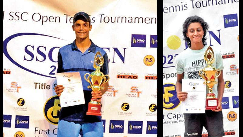 Thehan Wijemanne poses with his trophy-Anjalika Kurera with her trophy