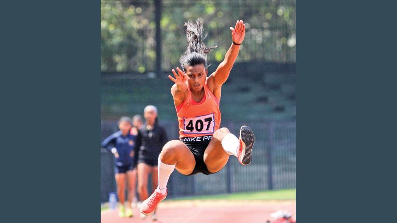 Surangi Silva does the long jump (Pic by Jagath Iroshana)