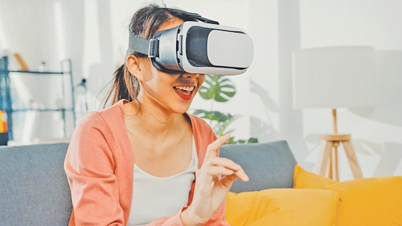 A volunteer undergoing Virtual Reality experience