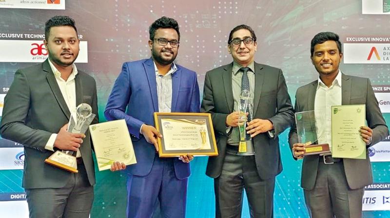 The Utech team with the awards. From left - T Zameem Amanulla - Asst. Manager, Sales and Admin, Senura Keheliya - Snr. R&D Engineer, Riyad Ismail - Managing Director/CEO and Chamith Koperahewa - Snr. R&D Engineer