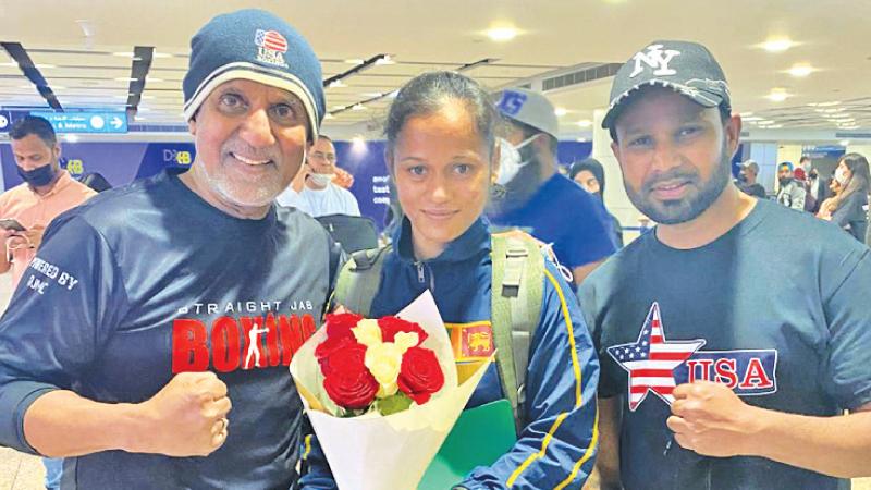 Kaumini Hashini is welcomed on arrival in Dubai by Bandula Ratnapala (left) and matchmaker Roshan Nathaniel from India