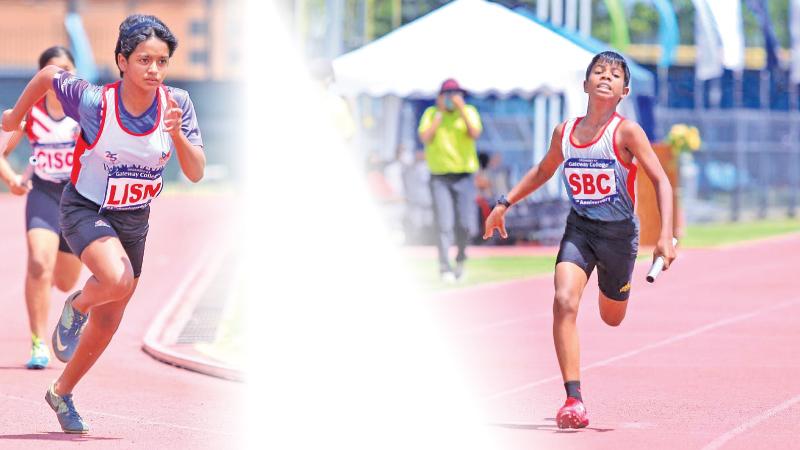Limandee Hettiarachchi (U-14) of Lyceum International School Nugegoda leads at the bend-Senuka Kalhara (St. Benedict’s College Kotahena) finishing well ahead in the U-12 event