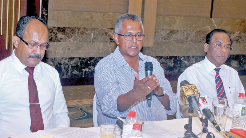 From left: SLAITO President Thilak Weerasinghe, Tourism Advisory Committee Chairman Hiran Cooray and THASL President M.  Shanthikumar at the briefing. Pic: Saliya Rupasinghe