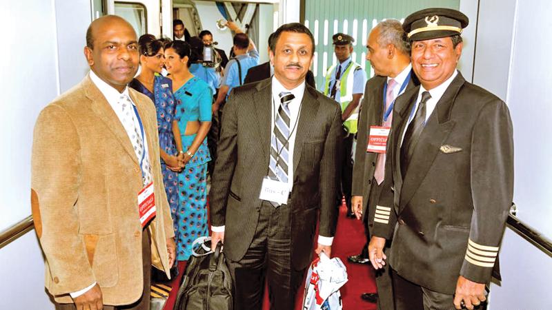 Upul Dharmadasa with the Captain of the first flight to Mattala