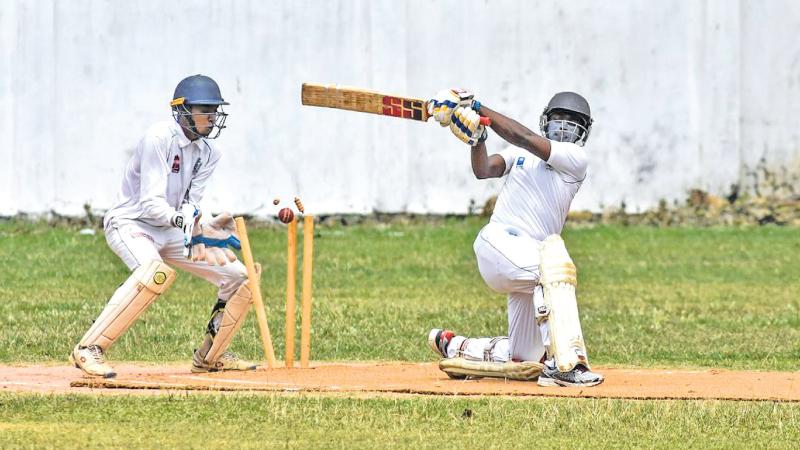 Action from the historic cricket match between Army SC and Colombo Malay Cricket Club