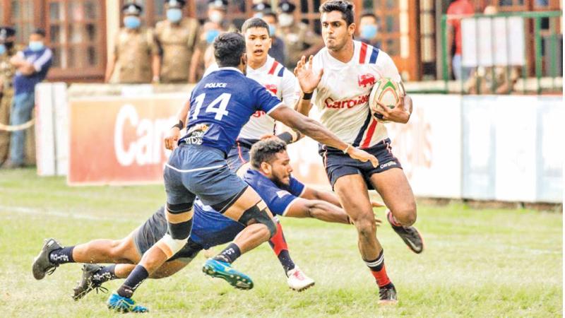 Kandy SC player Jason Dissanayake makes a break in this file photo against Police in their first round match at Nittawela