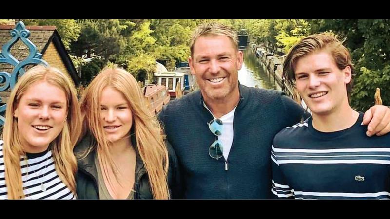 File photo of Shane Warne with his children Jackson, Brooke and Summer