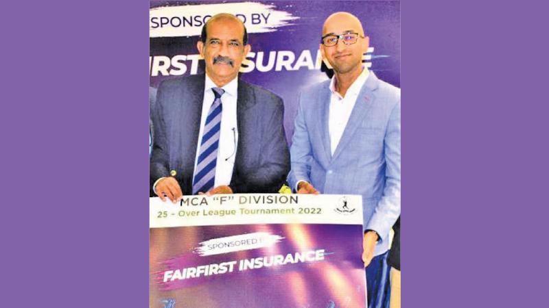 Chief Executive Officer of Fairfirst Insurance Sandeep Gopal (right) presents the sponsorship to the president of the Mercantile Cricket Association Nalin Wickramsinghe
