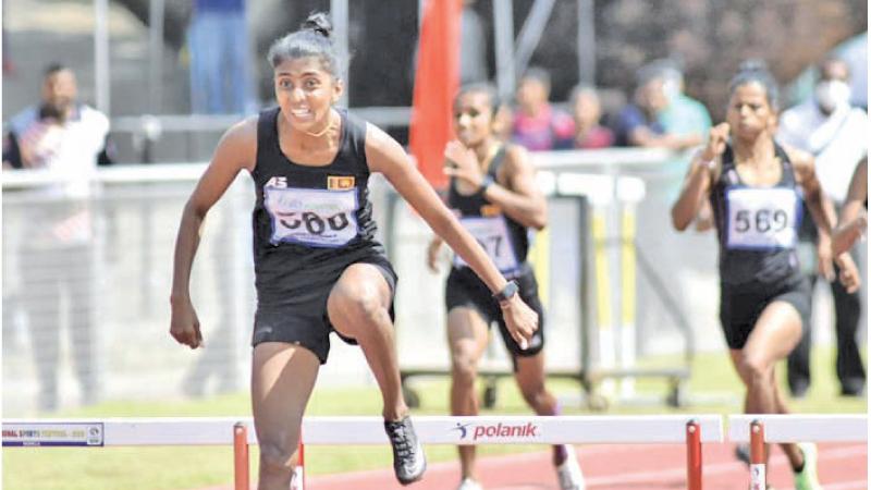 Amesha Hettiarachchi leading the way in the 400m hurdles event