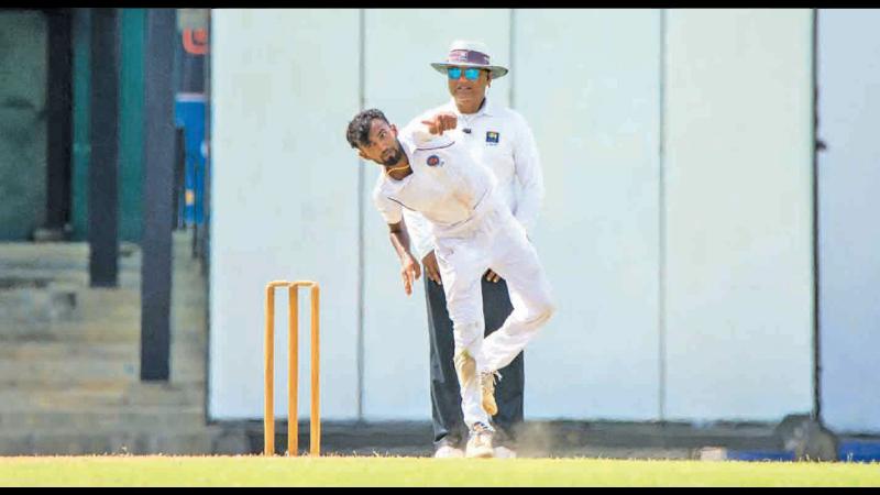 Dilum Sudeera bowls during his seven-wicket haul. (Pic SLC)