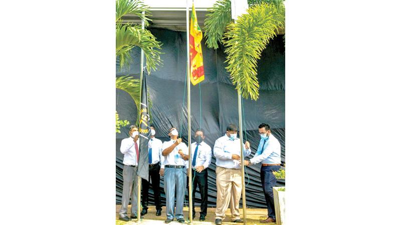 The hoisting of flags to  mark the occasion. 