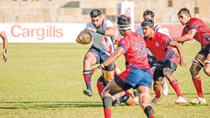 File picture of Kandy SC fly half Tharinda Ratwatte in action against CR and FC in a first round Nippon Paint League rugby match