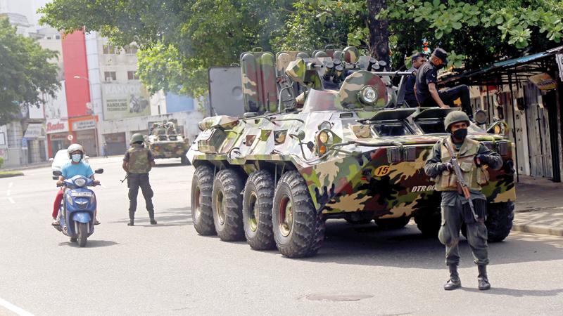 Political stability is an utmost necessity for an enabling business environment. Here an Army patrol in Colombo. Pic: Rukmal Gamage