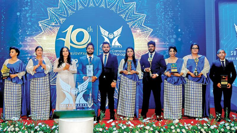 Tenth anniversary celebrations: From left - Marketing Manager, Asha Jayasinghe, Japanese Academy Manager, Manjula Munasinghe, Director of Surado Campus, Disani Dhanushika, Chairman and CEO of Surado Campus, P.S.R. Buddhika; Branch Operations Manager, Eranga Thennakoon, Marketing Manager, Hasara Liyanage, Student Relationship Manager, Supun Subhashana, Business Development Manager Indika Jayasinghe, Assistant Marketing Officer Pawani Somawansha and Business Promotional Manager Waruna Perera.