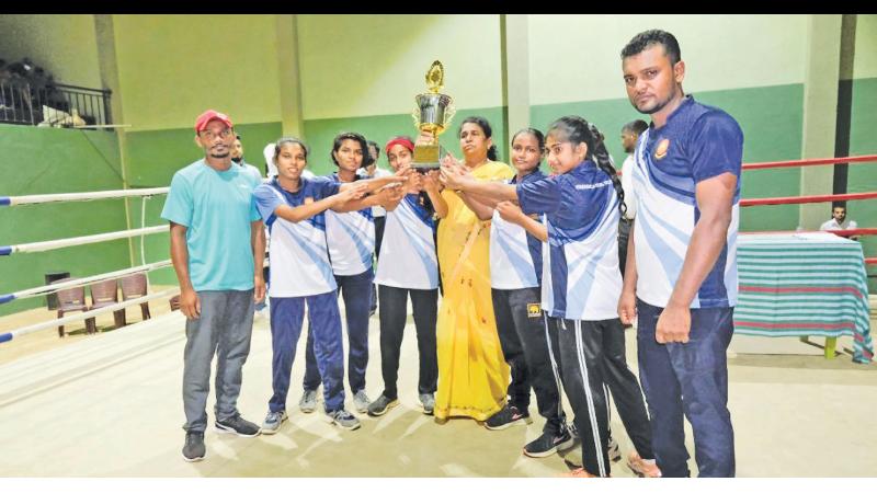The champions Poramadulla National School, Hanguranketa with their coach Jamitha Bandara (right). The team comprised KGYP Ratnayake, RUMGI Ratnayake, MDT Bandara, PMIS Paditharathna, MMSD Mahalekam and SKAN Sandeepani