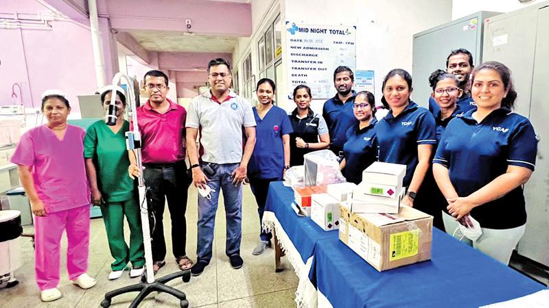 Members from the CA Sri Lanka YCAF handing over the medical equipment to the Lady Ridgeway Hospital