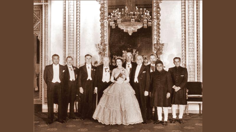 Dudley Senanayake with Her Majesty Queen Elizabeth at Buckingham Palace in 1952 