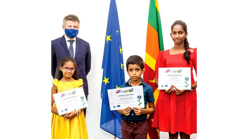 The three winners with the EU Ambassador to Sri Lanka and the Maldives Denis Chaibi