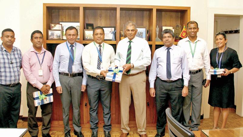 SLT Group Chairman Rohan Fernando and officials at the launch