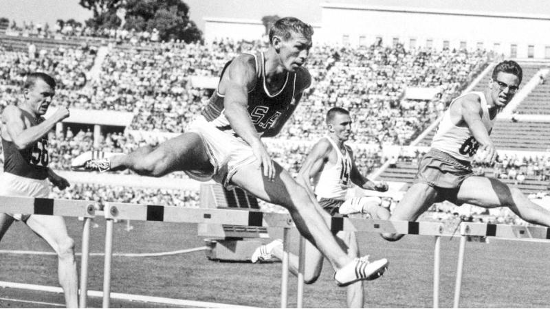 Glenn Davis on his way to Gold sweep of 400m Hurdles medals in 1956