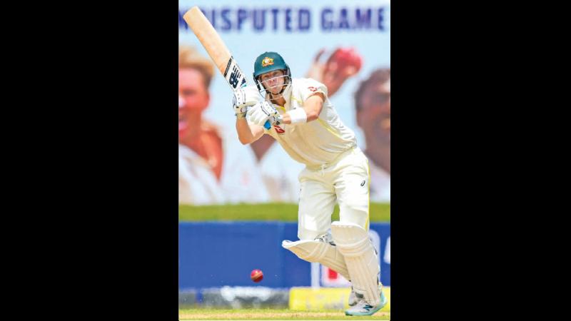 Steven Smith drives a ball to the boundary during his unbeaten 145