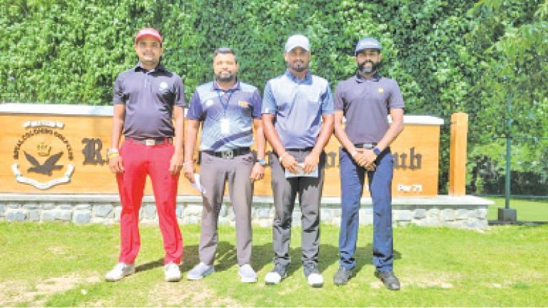 The top three (from left) Chalitha Pushpika (winner), Pradeep Kumara (deputy national coach of SLG), Chanaka Perera (first) 