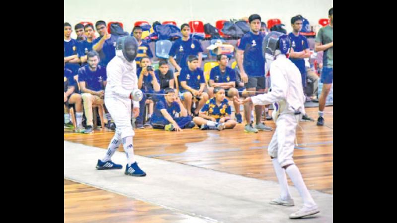 A fencing bout in progress