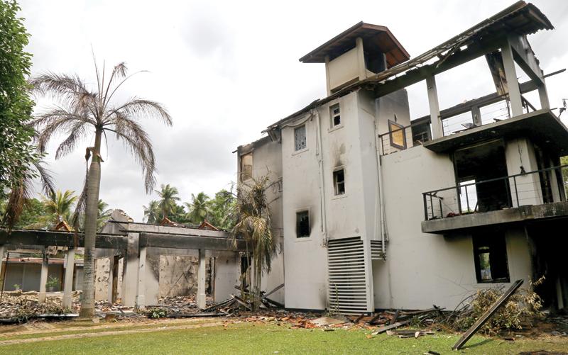 When will all this end. Here the remains of a Minister’s house which was burnt down by mobs. Pic: Rukmal Gamage