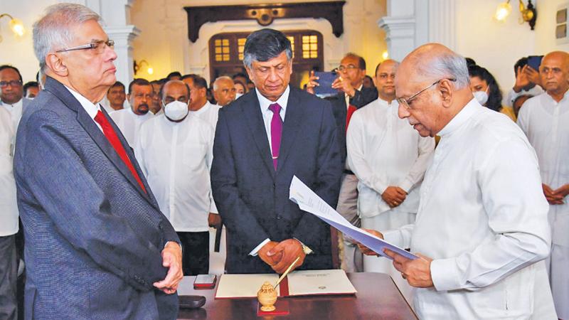 Leader of the House Minister Dinesh Gunawardena took oaths as the new Prime Minister before President Ranil Wickremesinghe on Friday (July 22).