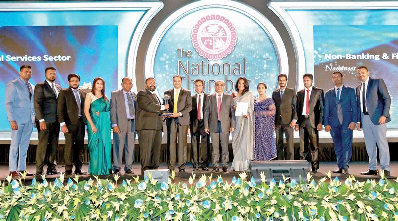Flexprint Managing Director Sathis Abeywickrama and the team with the award