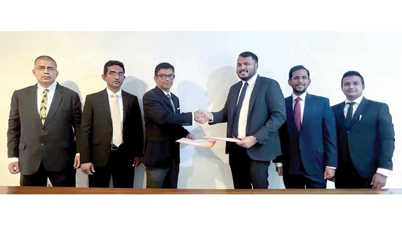 After signing the MoU. From left: Treasurer, SLFFA, Andre Fernando, Vice Chairman, SLFFA, ChannaGunawardena, Chairman, SLFFA, Dinesh Sri Chandrasekara, Chairman, YoungShip, RishanthaMendis, Secretary, YoungShip, NirmalDissanayake and Treasurer YoungShip, Prashan Fernando.