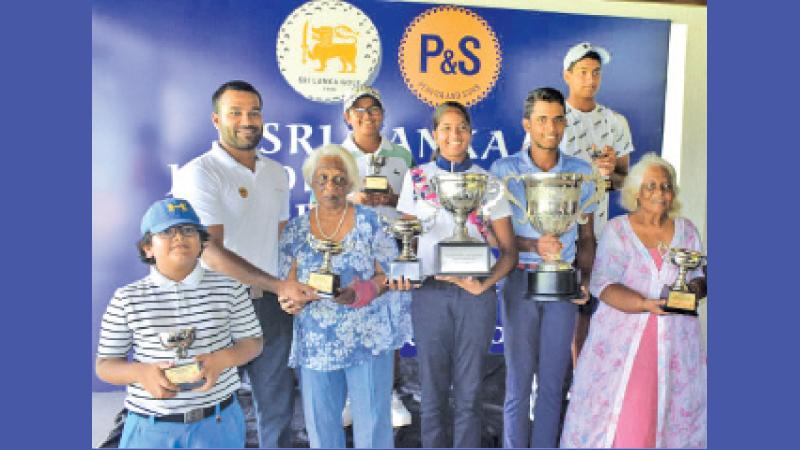 Golf winners pose with their trophies. From left: Yuvan Rathis Kanth, Avishka Perera, Shan Perera, Thejar Rathis Kanth, Kaya Daluwatte, Haroon Aslam, Reshan Algama and Srima Seneviratne  (Pic by Herbert Perera)