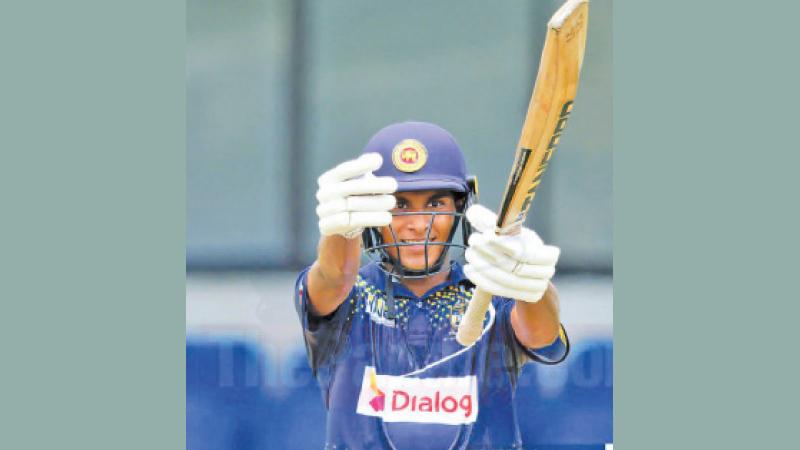 Danal Hemananda celebrates a feat in Sri Lanka youth attire