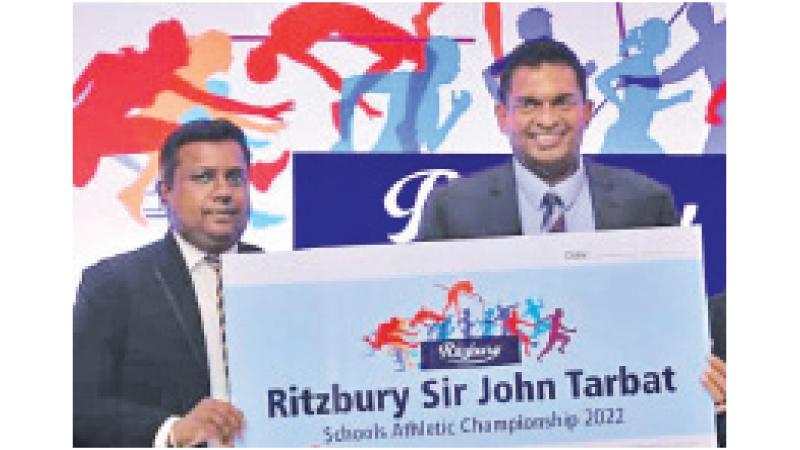 Nilupul de Silva, CBL Foods General Manager (right) presenting the sponsorship cheque to Dr. Kusal Fernando president of SLSAA  (Pic by Wimal Karunatilleke)