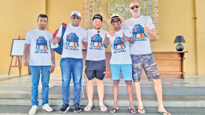 Bar Baruch (centre) launching the Racing for Sri Lanka project together with Chirath de Silva and Guy Rosenberg