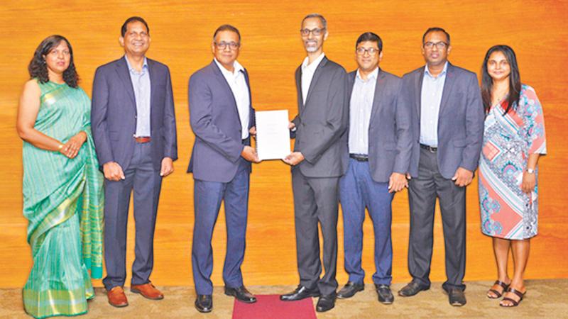 DFCC and SLASSCOM officials after signing the agreement