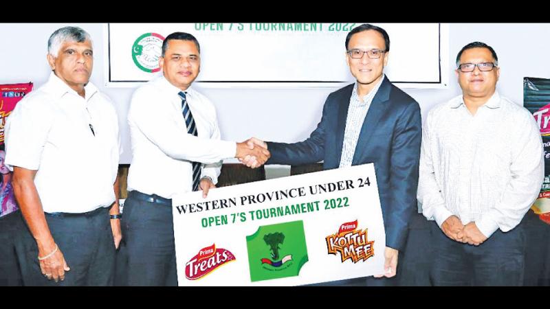 Nizam Jamaldeen (second from left) vice president of the Western Province Rugby Football Union (WPRFU) and Chairman of the Tournament Committee receiving the sponsorship from Lawrence Chan (Group GM, Prima Group Sri Lanka) in the presence of Roshan Deen (left) the president of the WPRFU and Sajith Gunaratne (Deputy GM Ceylon Agro Industries, Prima Group Sri Lanka)