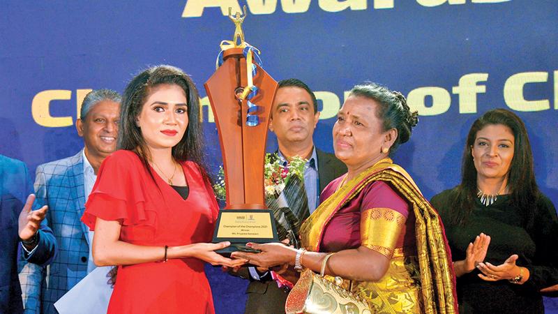 Ms. Priyanka Kamalani receivesthe Champions of Champion Award from her mother