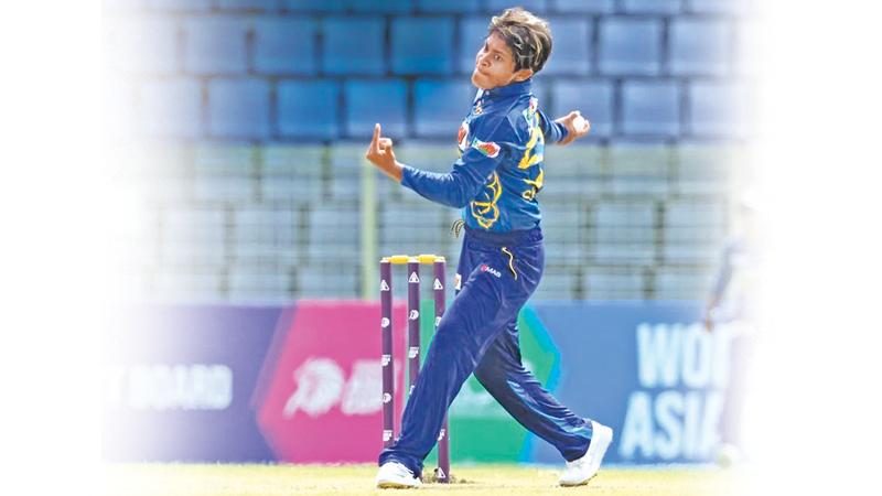 Malsha Shehani bowls during her devastating spell against Malaysia