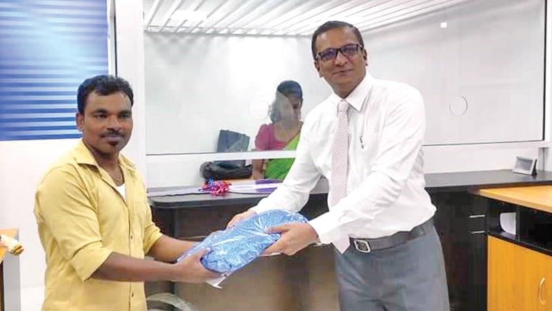 Chief Operations Officer of LOLC Finance Montini Warnakula makes the first transaction