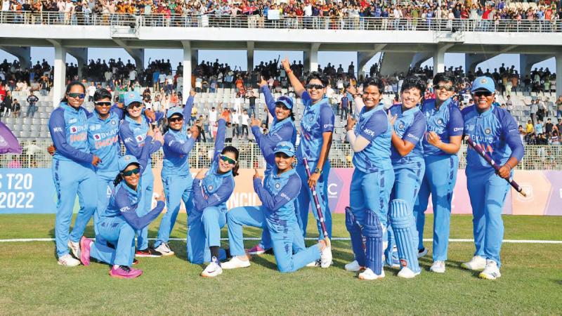 Indian players celebrate after the match