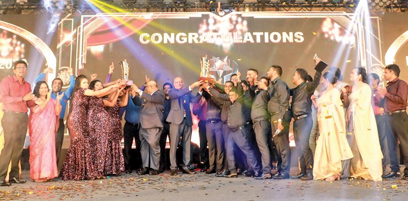 The winning branch officials with the award.