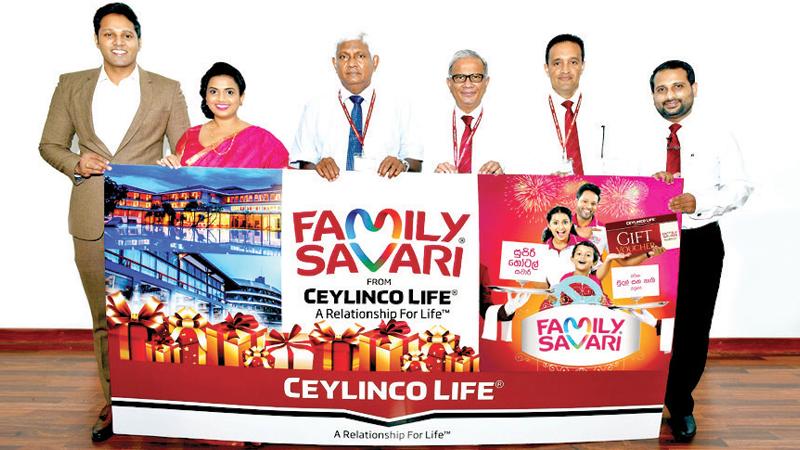 Ceylinco Life Chairman R. Renganathan and Managing Director and CEO Thushara Ranasinghe (third and fourth from left) with the Family Savari Brand Ambassadors and representatives of the company’s Marketing team at the launch of Family Savari 16.